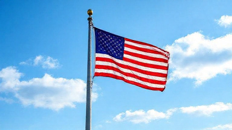 librarian in cardigan scanning books at Vermilion Public Library with a "Patriot Weather" poster behind her