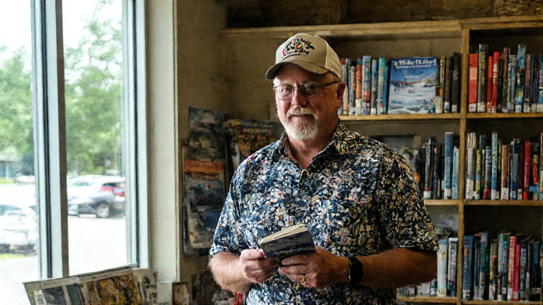 librarian in a floral dress browsing weather-themed books in a cozy, sun-dappled public library corner